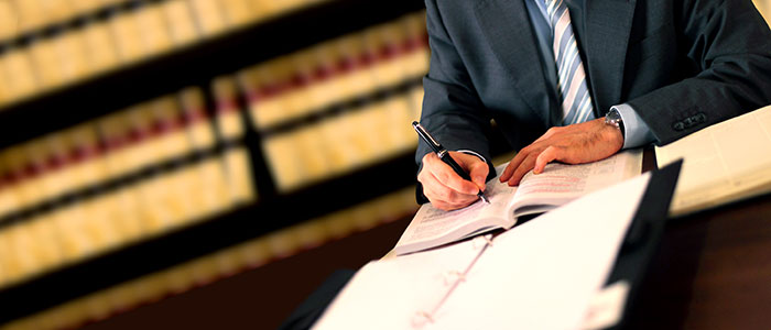 personal injury lawyer working at his desk